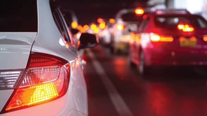 You can see the brake lights of the vehicle in front of you light up. How do you react to this?